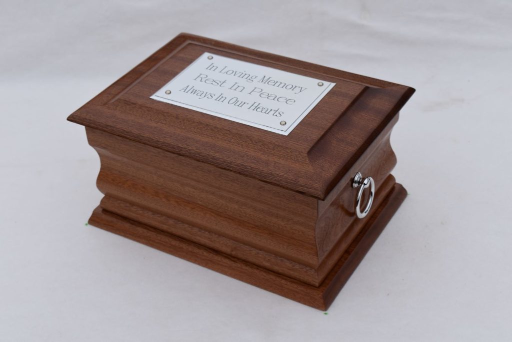 Mahogany casket with silver ring & plaque