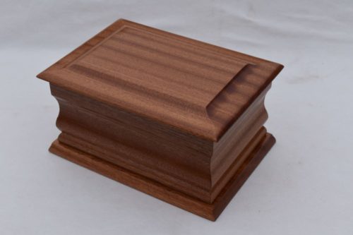 Plain ahogany moulded casket