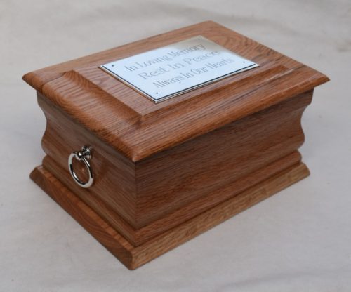 Oak casket with silver ring plaque